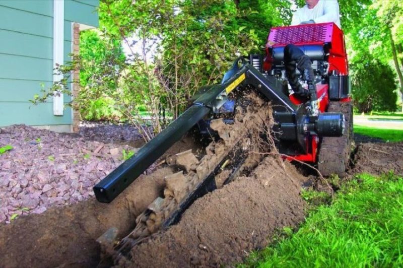 Use a Toro trx300 walk-behind trencher to install underground electrical wiring