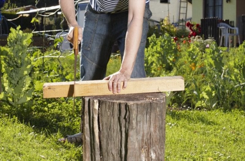 cutting lumber handsaw
