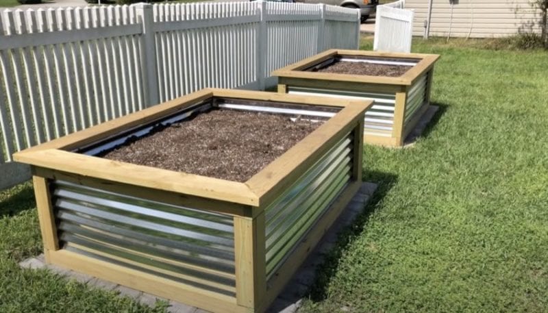 finished raised garden beds filled with topsoil