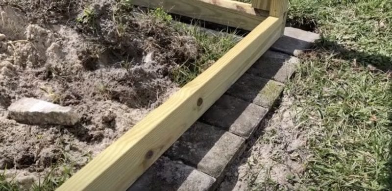 pavers under the raised garden bed