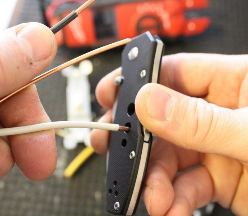 SOG EL10-CP Lock Back Knife wire stripping