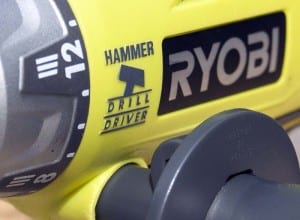 Ryobi P1812 Hammer Drill Kit Logo