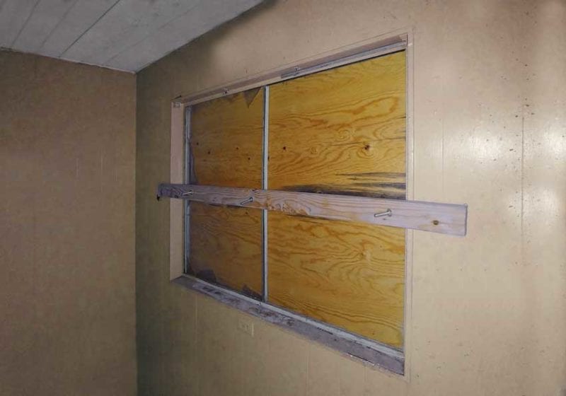 Carriage bolted plywood window