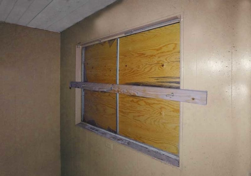 carriage bolting plywood block window