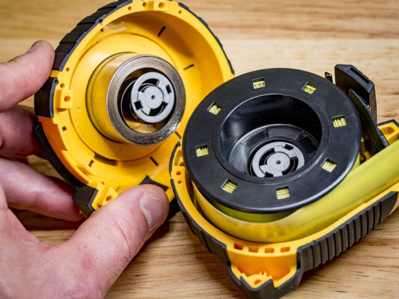 tape measure dual core spring mechanism