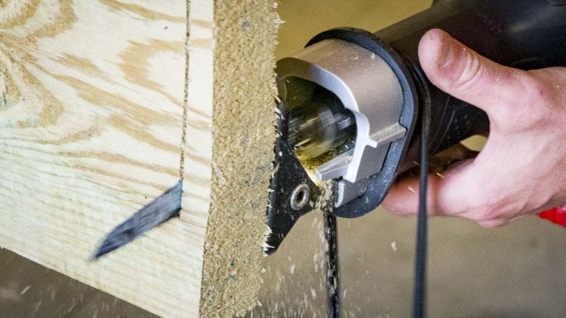 cutting through nail-embedded lumber