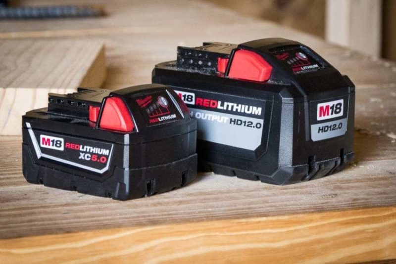 Milwaukee 12.0 Ah high output battery and XC 5.0Ah battery side by side