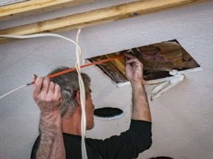 sending fish rods through a ceiling