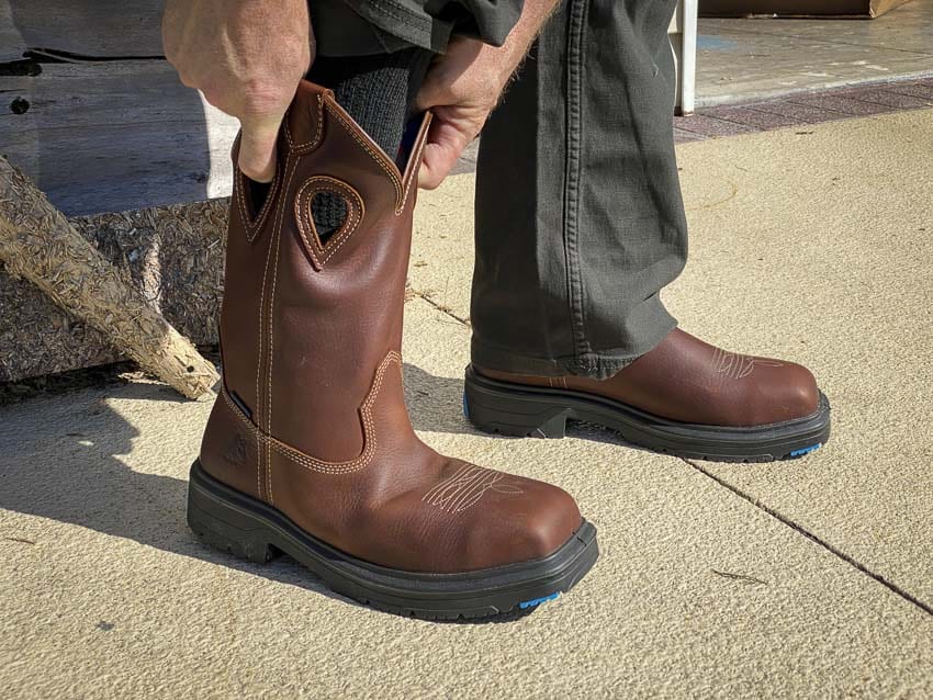 pulling on Steel Blue Blue Heeler boots