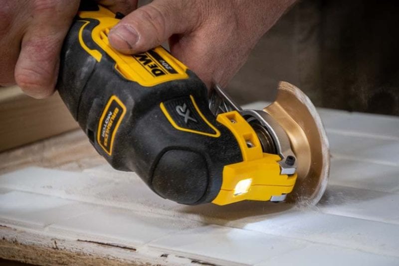 removing grout with DeWalt oscillating multitool