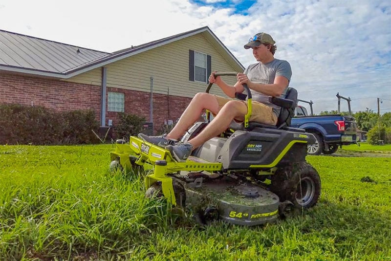 Ryobi HP Brushless 54-Inch Electric Zero Turn Mower Cutting Tall Grass