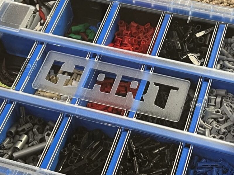 container with clear lid to see Lego bricks inside