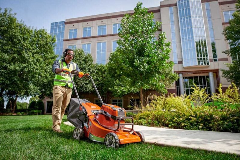 Husqvarna W520 mower with battery backpack attached