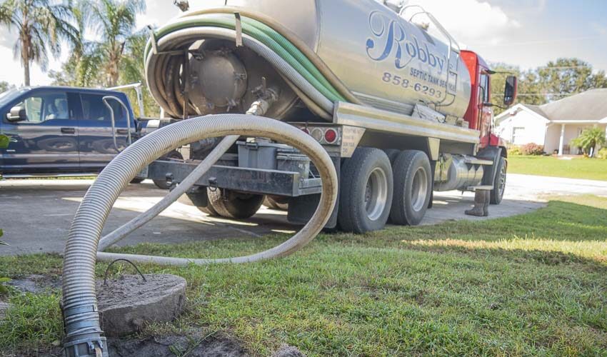 septic tank emptying costs routine service