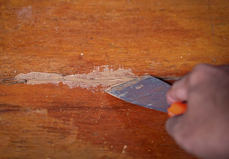 repairing wood floors with wood filler