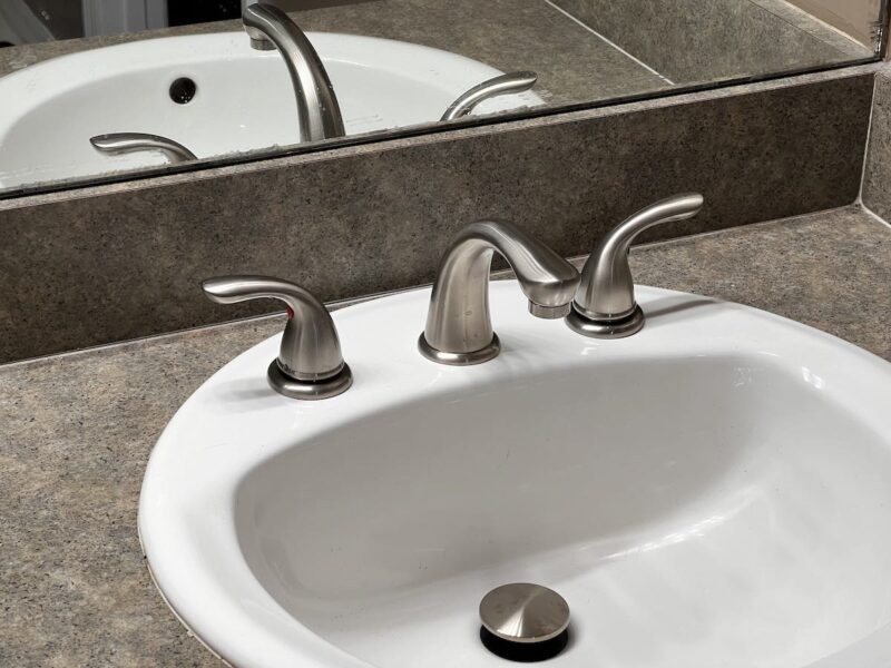 mirrored Pfister faucet brushed nickel
