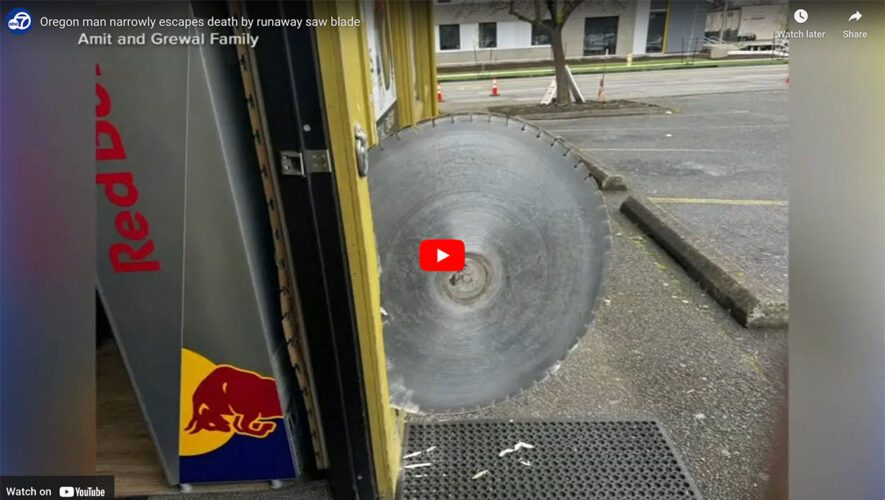 Giant Saw Blade Barely Misses Guy Walking into a Store (Video)