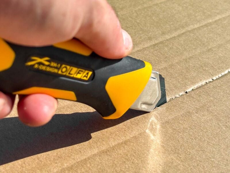OLFA Utility Knife Cutting Cardboard